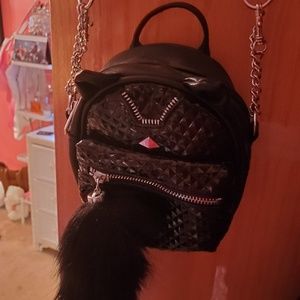 Claire's Mini black cat bag.